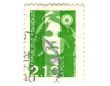 Old green french stamp with woman head