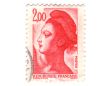 Old red french stamp with woman head
