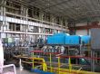 Machinery, tubes and steam turbine at a power plant