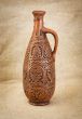 Ancient brown ceramic bottle
