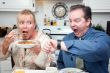 Stressed Couple in Kitchen Late for Work