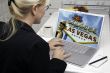 Woman In Kitchen Using Laptop - Las Vegas