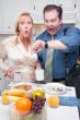 Stressed Couple in Kitchen Late for Work
