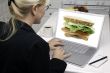 Woman In Kitchen Using Laptop - Food and Recipes