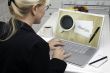 Woman In Kitchen Using Laptop - E-commerce