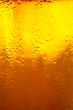 Glass of beer close-up with bubbles
