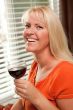 Attractive Blond with a Glass of Wine