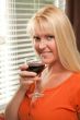 Attractive Blond with a Glass of Wine