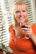 Attractive Blond with a Glass of Wine