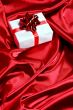 gift box on red satin background