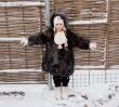 little girl at fence