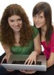 Two teenagers with laptop computer