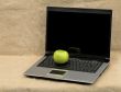 Laptop and green apple