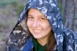 woman in a protective hood