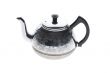 metal teapot on white
