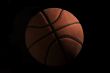 Basketball over black background