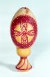 Easter egg of wood with red cross