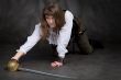 Girl on all fours with rapier