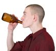 Young man with brown bottle