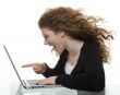 red haired teenager with laptop