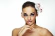 Sexy young woman with flowers