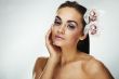 Sexy young woman with flowers