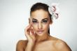 Sexy young woman with flowers