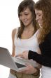 Two teenagers with laptop computer