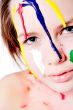 Wet colorfull paint dripping of my face