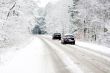 Cars on a white winter road