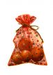 Present sack with oranges inside isolated