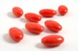 A few medicine tablets on a table