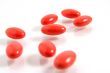 A few medicine tablets on a table