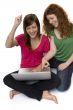 Two teenagers with laptop computer