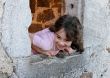 Smiling girl in the castle window