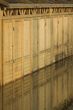 Wood wall with reflection in the water