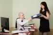 Bookkeeper and the secretary on a workplace