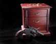 A box and revolver