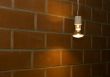 Light near brick wall