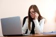 Young business woman in glasses work in office