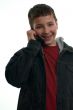 young happy boy with mobile phone