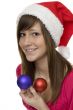 Merry Christmas, happy teenager with Christmas tree ball