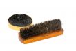 Shoe wax and a brush