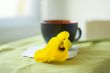 a cup of coffee and a calla