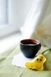 a cup of coffee and a calla