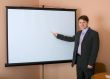Businessman near the white screen