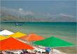 Colorful sunshades at the seashore.