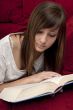  female teenager reads book