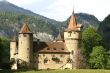 Castle in front of a mountain scenery
