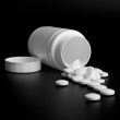 bottle with white pills